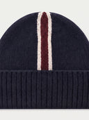 Close-up of the Cashmere Intarsia-Stripe Beanie in Navy, showing the wine red intarsia stripe with an off-white line on each side