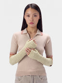 Model wearing the Cashmere Rib-Knit Fingerless Gloves in White, front view