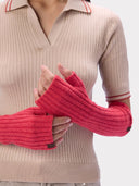 Model wearing the Cashmere Rib-Knit Fingerless Gloves in Bright Red, close front view