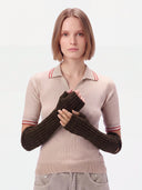 Model wearing the Cashmere Rib-Knit Fingerless Gloves in Mole Brown, front view