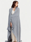 Model wearing the Cable Knit Cashmere Blanket in high rise, full-length front view
