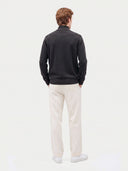 Model wearing the Seamless Cashmere Lightweight Crewneck Sweater in Charcoal, back view