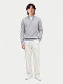 Model wearing the Seamless Cashmere Lightweight Crewneck Sweater in Light Gray, full-length front view
