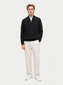 Model wearing the Seamless Cashmere Lightweight Crewneck Sweater in Black, full-length front view