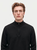 Model wearing the Seamless Cashmere Lightweight Crewneck Sweater in Black, close front view