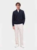 Model wearing the Seamless Cashmere Lightweight Crewneck Sweater in Navy, full-length front view