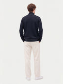Model wearing the Seamless Cashmere Lightweight Crewneck Sweater in Navy, back view