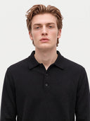 Model wearing the Cashmere Classic Polo Sweater in Black, close front view