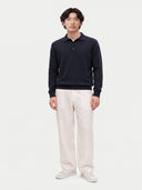 Model wearing the Cashmere Classic Polo Sweater in Navy, full-length front view