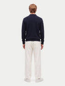 Model wearing the Cashmere Classic Polo Sweater in Navy, back view