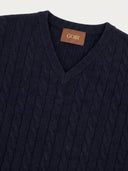 Close-up of the Seamless Cashmere Cable-Knit V-Neck Vest in Navy, showing the cable knit, the ribbed V-neck and the GOBI label