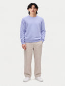 Model wearing the Cashmere Fine Crewneck Sweater in Classic Blue, full-length front view