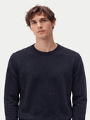 Model wearing the Cashmere Fine Crewneck Sweater in Navy, front view