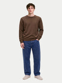 Model wearing the Cashmere Fine Crewneck Sweater in Dark Brown, full-length front view