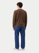 Model wearing the Cashmere Fine Crewneck Sweater in Dark Brown, back view