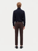 Model wearing the Cashmere Turtleneck Sweater in Navy, back view