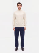 Cashmere Relaxed Crewneck Sweater in white, worn by a model
