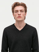 Model wearing the Cashmere V-Neck Sweater in Black, close front view