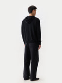 Men's Zip-Up Cashmere Hoodie Black worn by model, back view on white background
