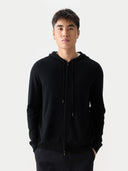 Men's Zip-Up Cashmere Hoodie Black worn by model, detail view on white background