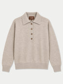 women's beige gray polo sweater on a light gray background.