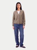 Model wearing the Cashmere V-Neck Cardigan in Taupe, full-length front view