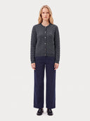 Cashmere Cable-Knit Crewneck Cardigan in black, worn by a model