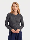 Cashmere Cable-Knit Crewneck Cardigan in black, worn by a model
