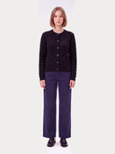 Cashmere Cable-Knit Crewneck Cardigan in black, worn by a model