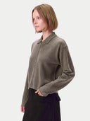 Model wearing the Cashmere-Silk Cropped Zip-Up Cardigan in Stone Taupe, three-quarter view