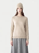Model wearing the Cashmere Hat & Sweater Set in Natural Beige, front view