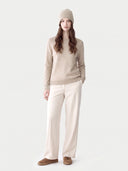 Model wearing the Cashmere Hat & Sweater Set in Natural Beige, full-length front view