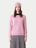 Model wearing the Cashmere Hat & Sweater Set in Light Pink, front view