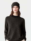Model wearing the Cashmere Hat & Sweater Set in Olive Brown, close front view
