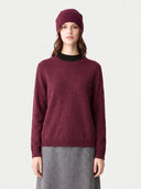 Model wearing the Cashmere Hat & Sweater Set in Wine Red, front view