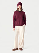 Model wearing the Cashmere Hat & Sweater Set in Wine Red, full-length front view