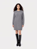 Model wearing the Seamless Cashmere Longline Cable Sweater in Dim Gray, full-length front view