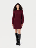 Model wearing the Seamless Cashmere Longline Cable Sweater in Wine Red, full-length front view