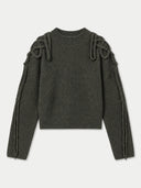 An olive green ribbed knit sweater with decorative knotted details on the shoulders and sleeve cuffs, displayed flat against a light gray background.