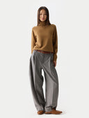 Women's Classic Cashmere Turtleneck Sweater Almond worn by model, front view, on white background