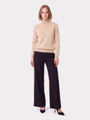 Cashmere Classic Turtleneck Sweater in beige, worn by a model
