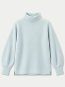 A knit turtleneck sweater with long balloon sleeves, shown flat against a light gray background.