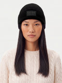 Model wearing the Cashmere Rib-Knit Beanie in Black, front view
