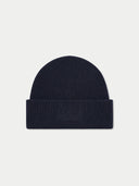 A dark navy blue ribbed knit beanie hat with a folded cuff, featuring an embossed 'GOBI' logo on the front, set against a light gray background.