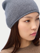 Model wearing the Seamless Cashmere Cuffless Beanie in Steel Gray, close front view