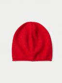 The Seamless Cashmere Cuffless Beanie in Bright Red, flat lay front view