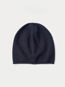 The Seamless Cashmere Cuffless Beanie in Navy, flat lay front view