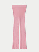 A pair of pink ribbed knit flare leggings shown flat against a light gray background. #color_icing-pink