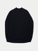 A black knit sweater with a crew neck and long sleeves, laid flat against a light gray background.