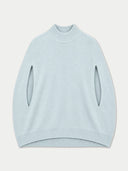 A light blue knit sweater with long sleeves featuring vertical cutouts, a ribbed mock neck, and a ribbed hem, shown against a light gray background.